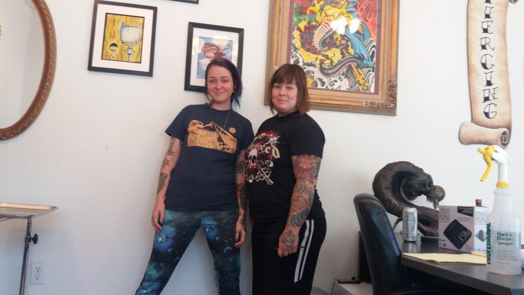 Tattoo artist Terra Walker (left) and piercer/owner Shanda Madrid inside PunkTured. Photo submitted.